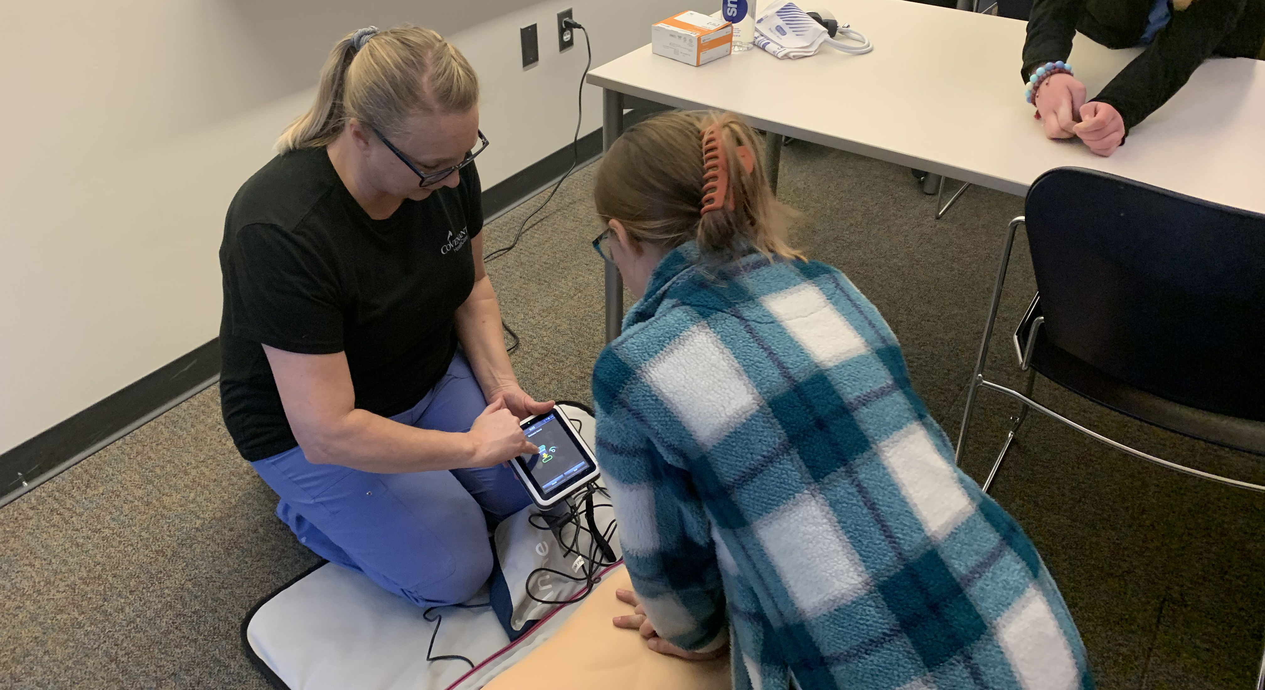 Teens learning about medical science.